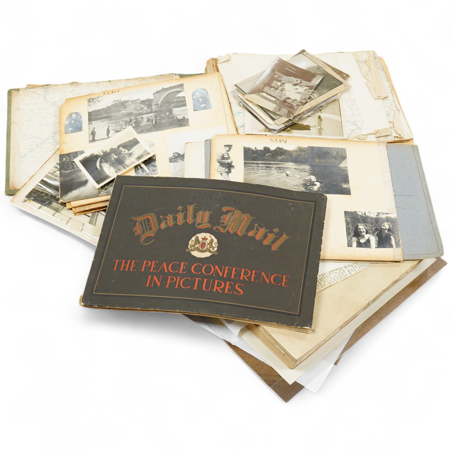 An archive of post First World War documents and photographs including two part letters signed by Winston Churchill